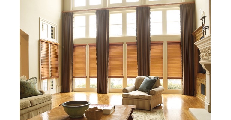 Philadelphia great room with wooden blinds and full-length drapes.